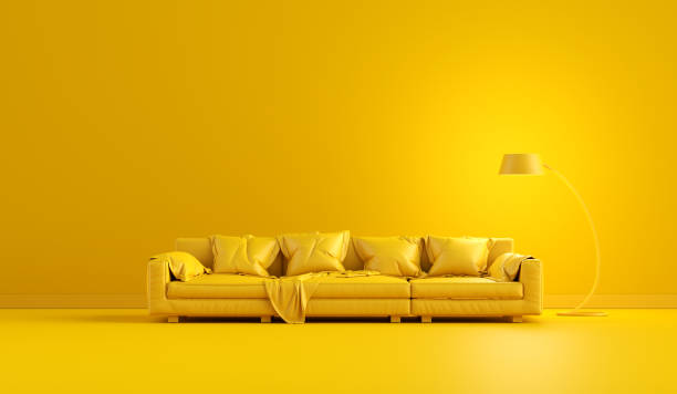 istock Yellow monochrome interior with modern leather sofa and a floor lamp with copy space. 1675546582