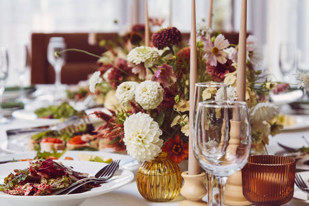 istock Elegant aesthetic wedding table setting, flowers arrangement 1675561423