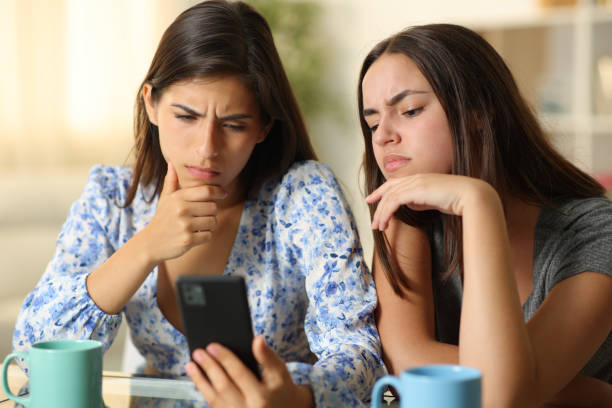 istock Disappointed women watching media on phone 1675563291
