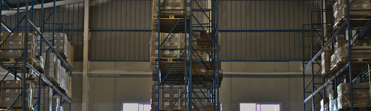 Pallet storage racks in an industrial warehouse