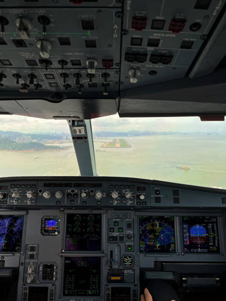 istock cockpit point of view airplane is landing vertical still 1675588731