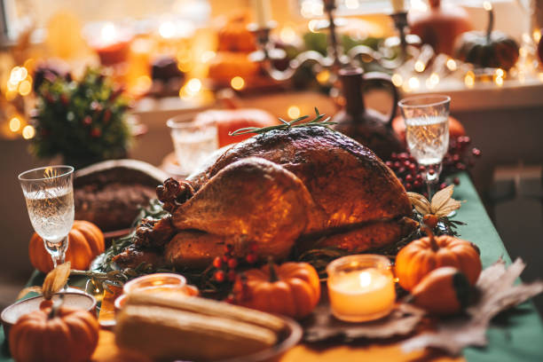 istock Thanksgiving holiday dinner table setting with fall decoration and pumpkins 1675626006