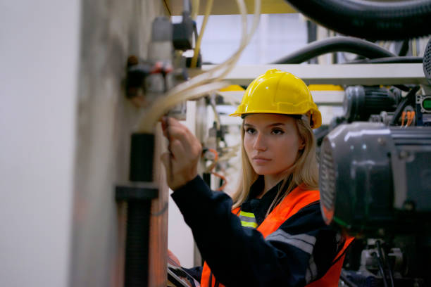 istock Blue collar worker work at cardboard box manufacturing factory. 1675629307