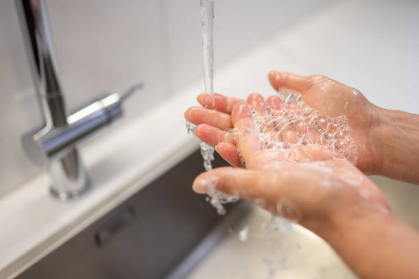 istock Woman washing hands 1675686451
