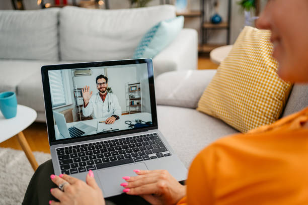 istock Young Woman Having A Doctor's Appointment Online At Home 1675710976