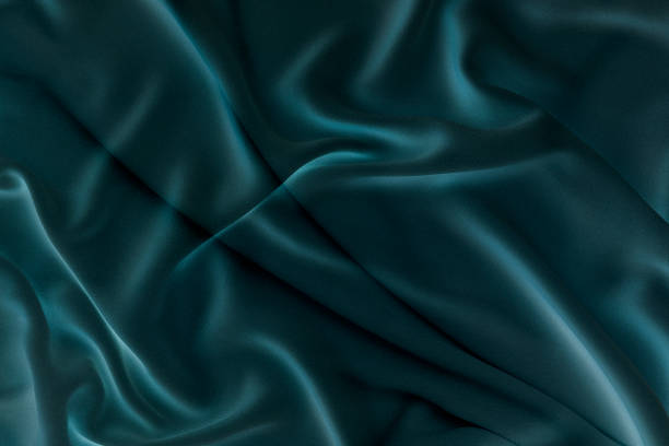 istock Abstract waving dark satin fabric background 1675728981