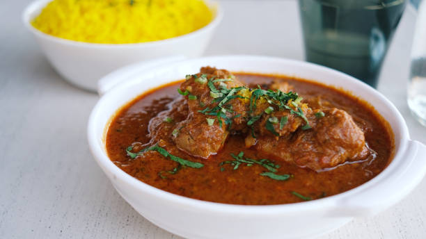 istock Chicken Kohlapuri icooked in coconut milk. 1675759610