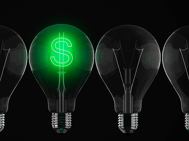 istock Green dollar sign illuminated in row of light bulbs 167577429