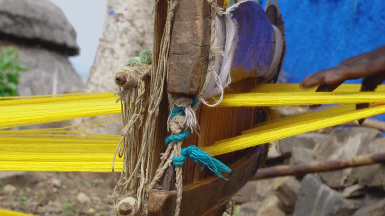 Old Fashioned Wooden Loom Weaving In Konso Town, Omo Valley In Ethiopia. Close Up