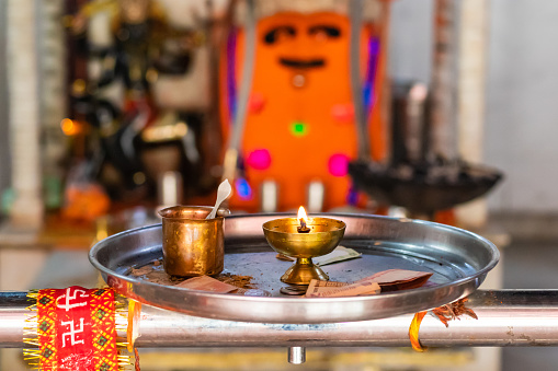 hindu temple aarti the worship offering plat at temple with burning oil lamp and holy water