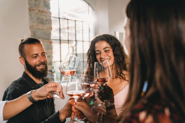 istock Friends are celebrating together with wine glasses 1675804768