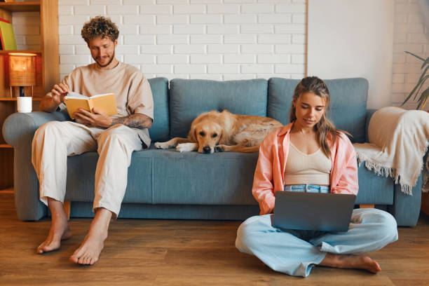 istock Young couple in love spending time together at home 1675828986