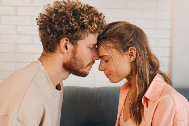 istock Young couple in love spending time together at home 1675829321