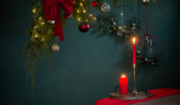 istock red  and golden christmas decor on table on dark background 1675841241