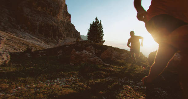 istock Two men trail running on mountain: the Dolomites 1675860418