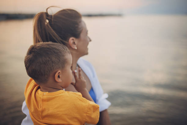 istock Woman with son on vacation 1675891574
