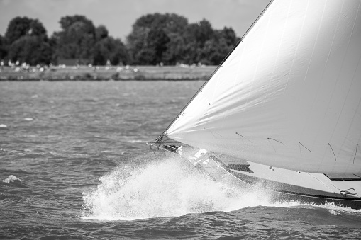 Skûtsje classic Frisian sailing Tjalk ship during the 2019 annual SKS Skûtsjesilen races on the IJsselmeer near Lemmer, Netherlands. The race at the IJsselmeer was won by the Skutsje of Grou.
