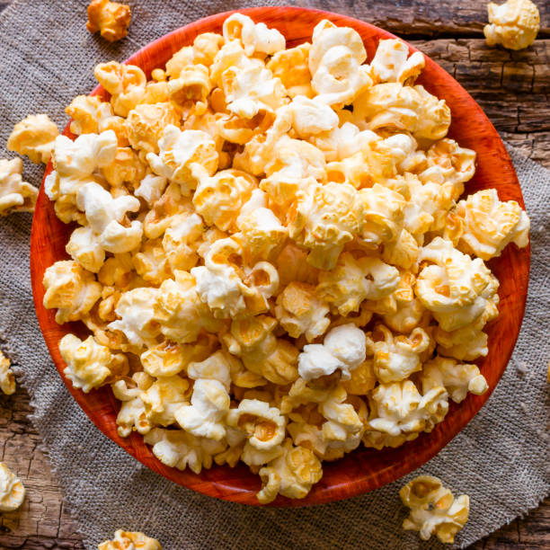 istock plate with popcorn on a napkin on a wooden background 1675914548