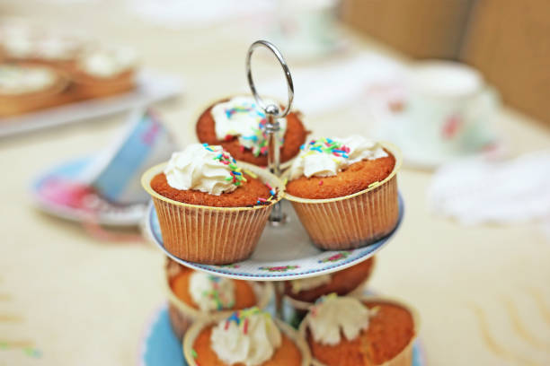 istock delicious cupcakes at a kid party - party scene with sweets 1675919175