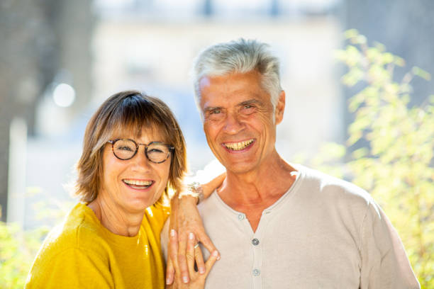 istock Close up happy mature couple standing next to each other 1675921371