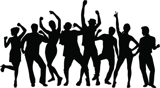 A group of people dancing in silhouette.