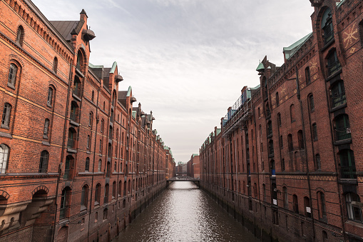 Perspective view of Brooksfleet. The Speicherstadt, warehouse district of Hamburg, Germany. The largest warehouse district in the world where the buildings stand on timber-pile foundations of oak logs
