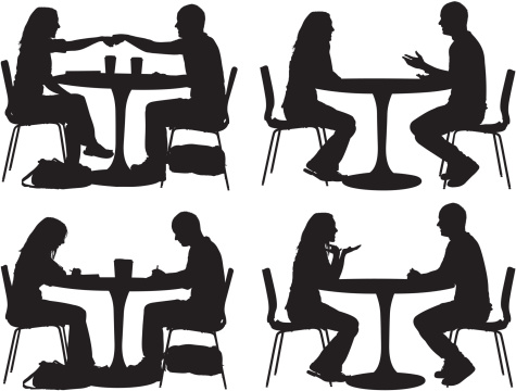 Silhouette of couples in a restaurant