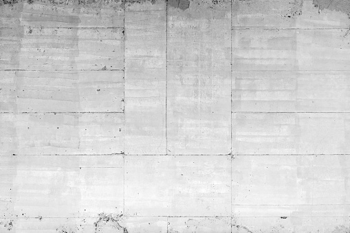 White concrete wall, background photo texture, frontal view