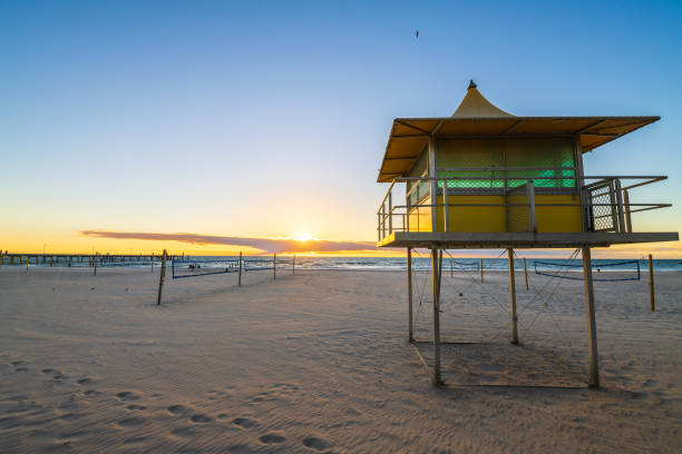 istock Glenelg Beach Surf life saving tower at sunset 1675966534