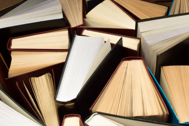 istock Background from old and used hardback books. Copy space for text. 1675972476
