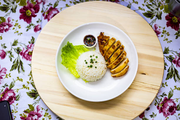 Grilled Chicken Breast with Rice On The Table