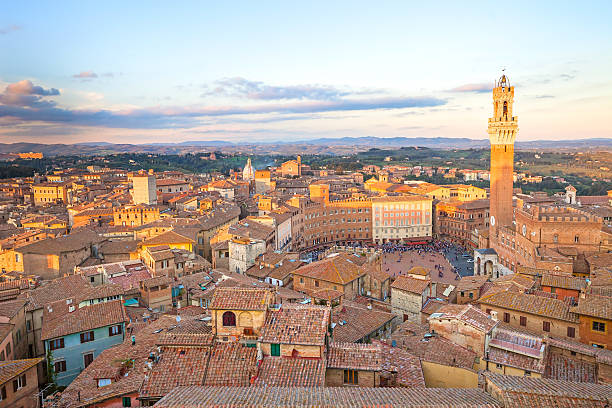 istock Siena sunset panoramic skyline. Mangia tower landmark. Tuscany, 167598925