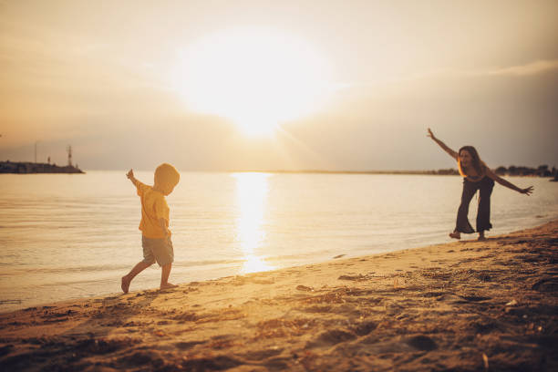 istock Mother enjoying with son on vacation 1675994892