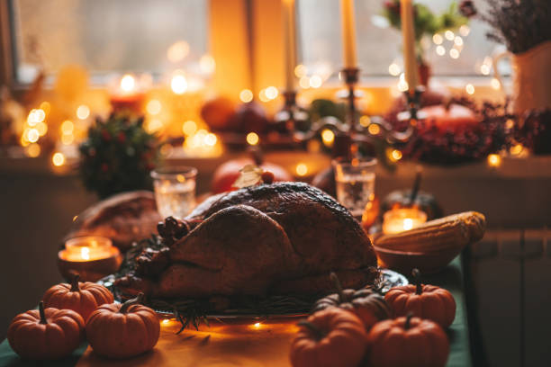 istock Thanksgiving holiday dinner table setting with fall decoration and pumpkins 1676002504