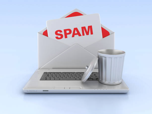 3D Spam Envelope with Computer Laptop and Garbage Can stock photo