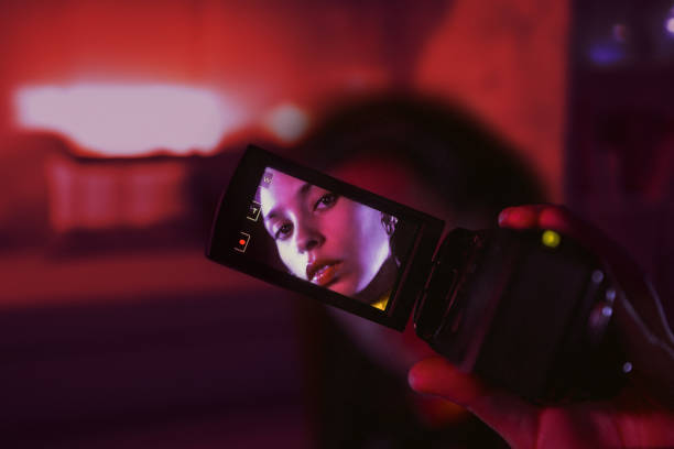 Young woman handy cam portrait\nVideo diary \nAesthetic and cinematic retro futurism vibes