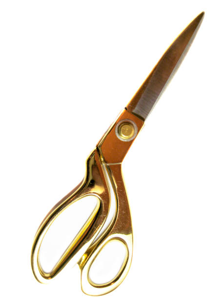 istock Sew scissors with a gold handle on the white background isolated 1676030021