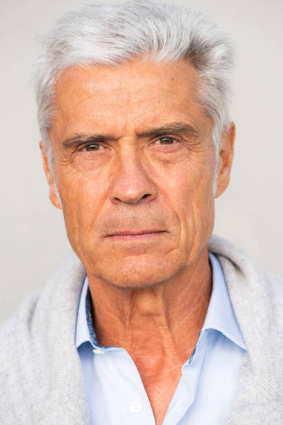 istock headshot of handsome older man with serious expression 1676039709