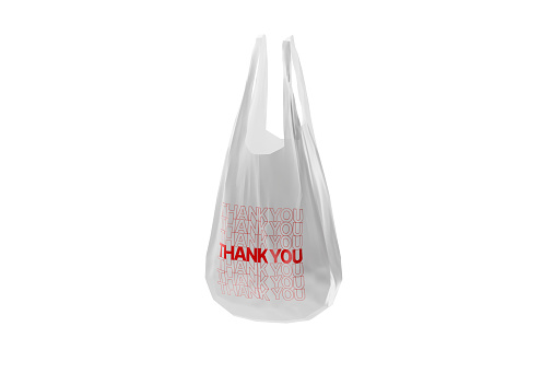 White plastic grocery or shopping bag that looks like something is inside isolated on white background