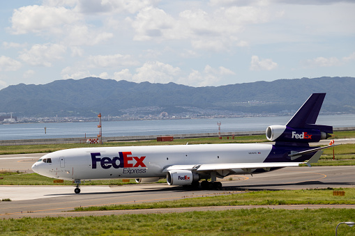 Osaka, Japan - September 1, 2023 : FedEx Express McDonnell Douglas MD-11F at Kansai International Airport in Japan.