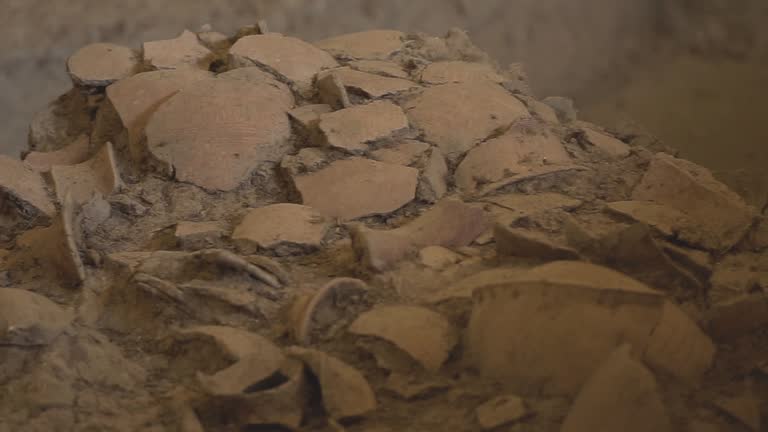 Ancient pottery relics unearthed in the area are in the soil.