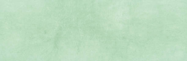 istock abstract Light green pastel concrete texture background. Cement Stucco surface backdrop 1676061289