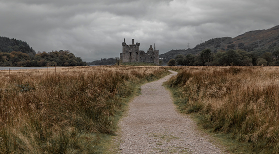 Beautiful countryside landscape of a castle ruin in the highlands in Scotland