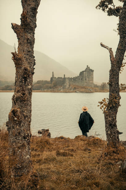 istock Hiker outdoors at a ruined castle in Scotland 1676067523
