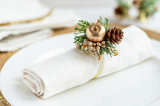 Christmas place setting table decoration, festive home decor in gold and white