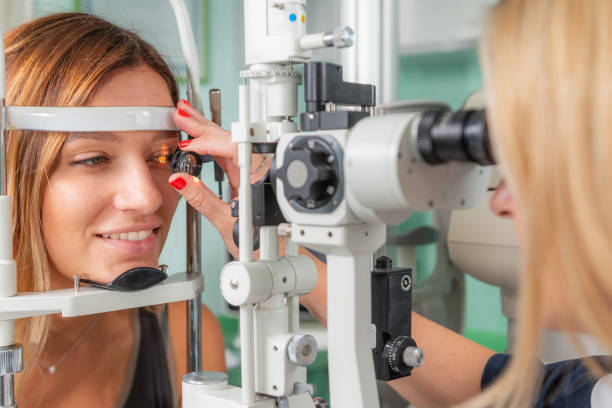 istock Detailed ophthalmological examination using a magnifying glass 1676081941