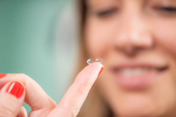 istock Expert Ophthalmologist Inserts Soft Contact Lens 1676081949