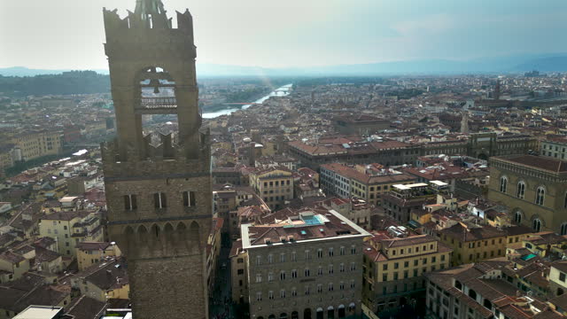 Palazzo Vecchio Clock Tower in Florence, aerial view of Palazzo Vecchio in Florence, Historically and Culturally Rich Italian Town Florence, Firenze - Aerial view of the city of Florence, Popular tourist destination in the world
