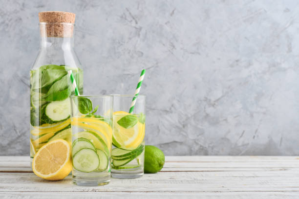istock Bottle and two glasses with infused water 1676098859