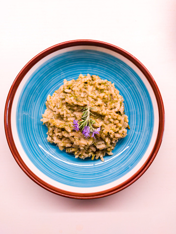 Plate of Delicious Risotto with Wild Asparagus and a Touch of Rosemary